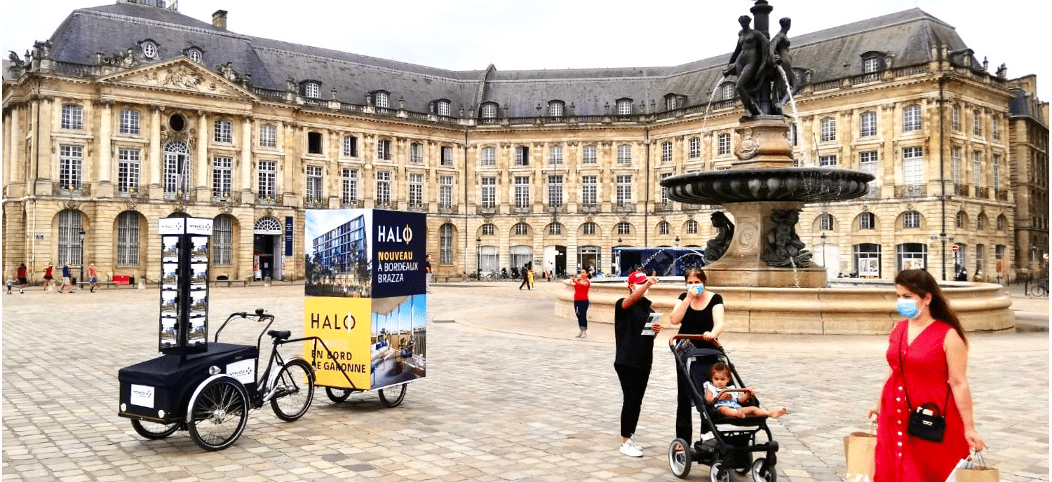 VeloExpo Bordeaux pour Vinci Immobilier Halo Bordeaux. Campagne communication ooh hors-media par activation affichage mobile avec vélo triporteur publicitaire street marketing | Velo Expo | Agence Veymont